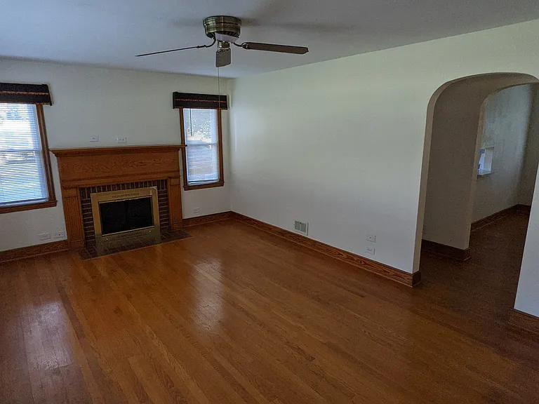 Living room with onamental fireplace