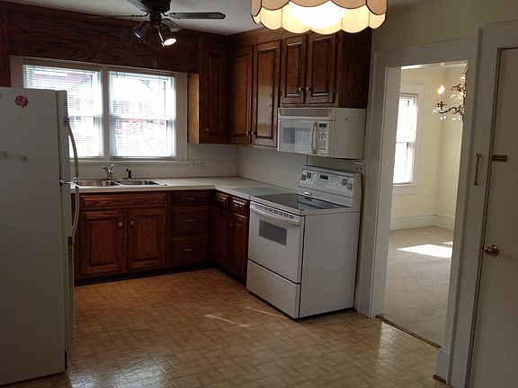 Kitchen connected to dining 