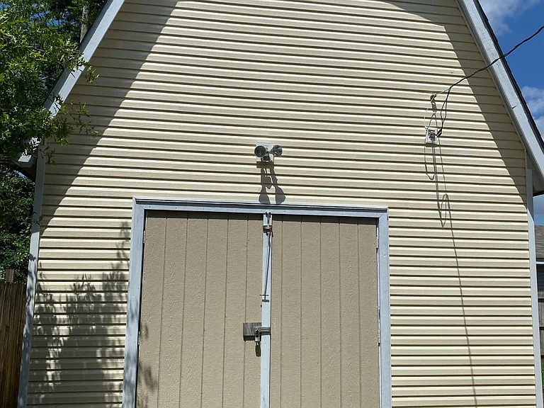 Even more storage/workspace--workshop with attic storage in private backyard.