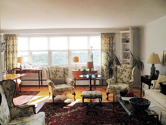Panoramic tree-top views from this Penthouse apart