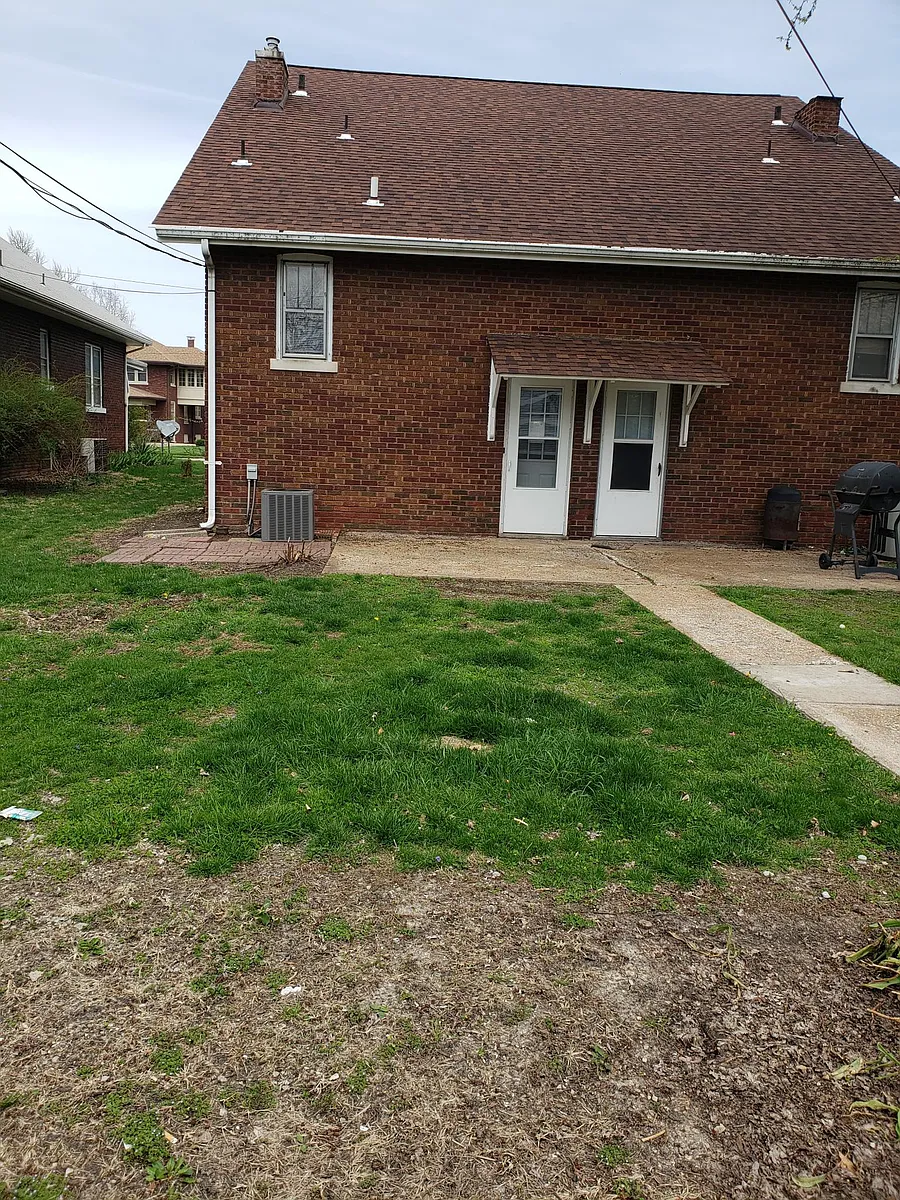 Back entrance from parking lot - 3206 W Main St