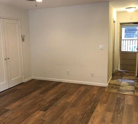 Living area showing large closet with lots of room