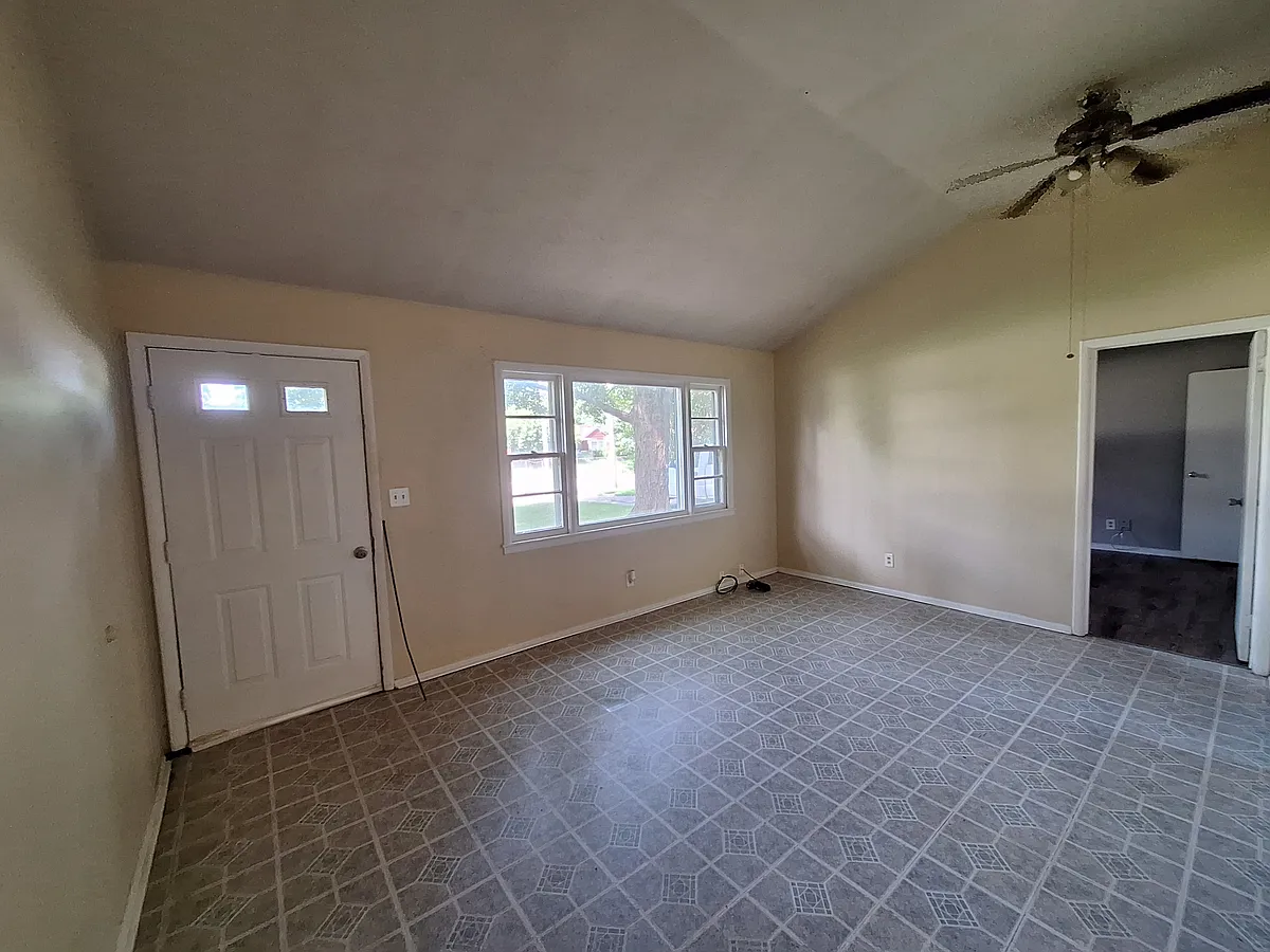 Living Room at front door - 7005 John Adams Way