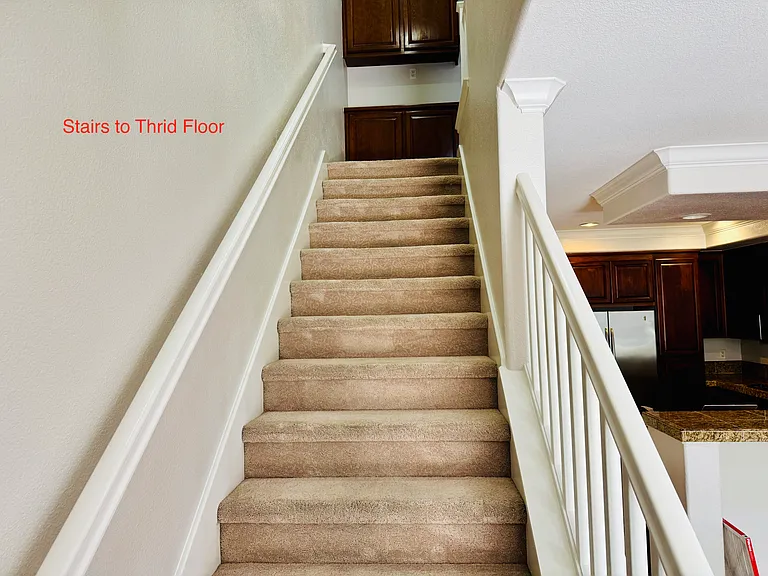 Stairs to third floor