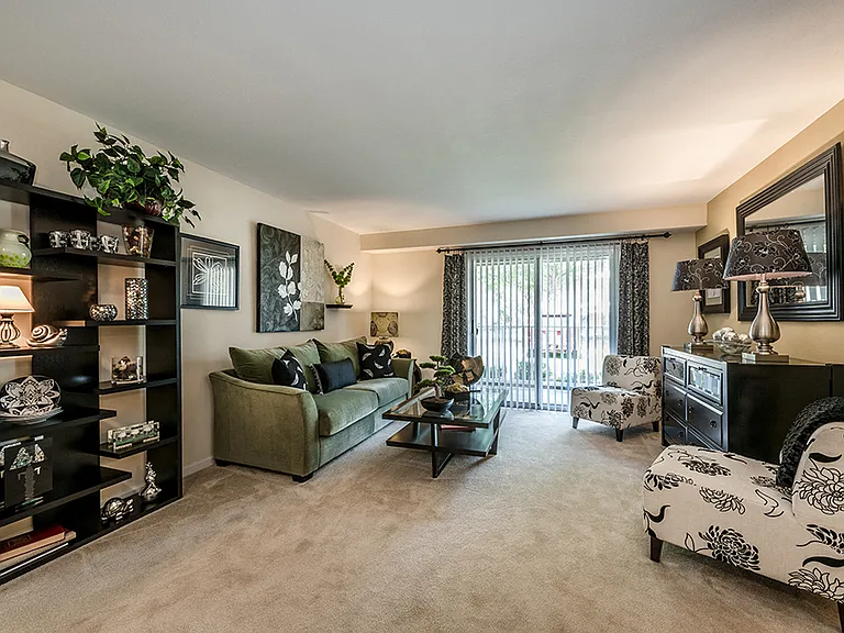Open concept living and dining room in our 3 bedroom garden apartment at River Mews
