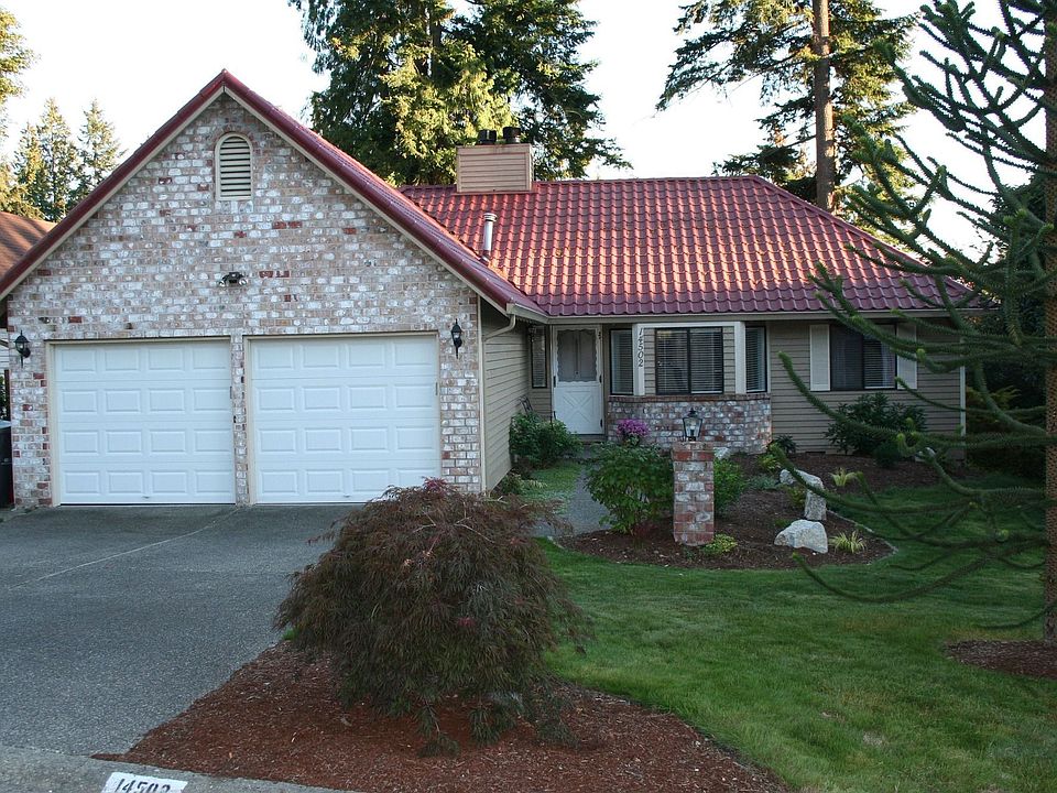 Front of House with newly landscaped yard