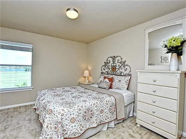 Third bedroom. Remote-controlled ceiling fan added in 2022.