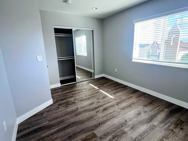 Secondary bedroom with closet