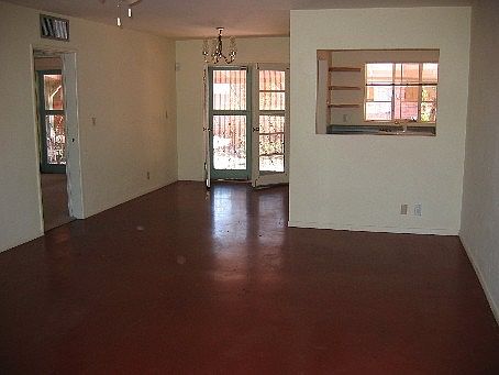 Living room with dining area near French doors