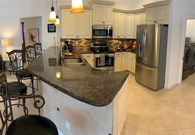8906 Lely Island Cir — Photo 18