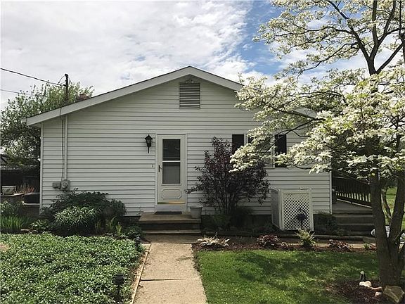 Side entrance and beautiful landscaping