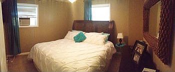 Master bedroom freshly painted with new carpet.