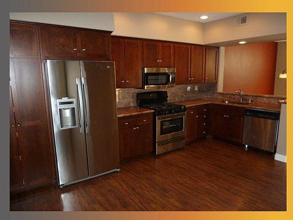 Custom Kitchen & Wood Floors & Stainless Steel Appliances