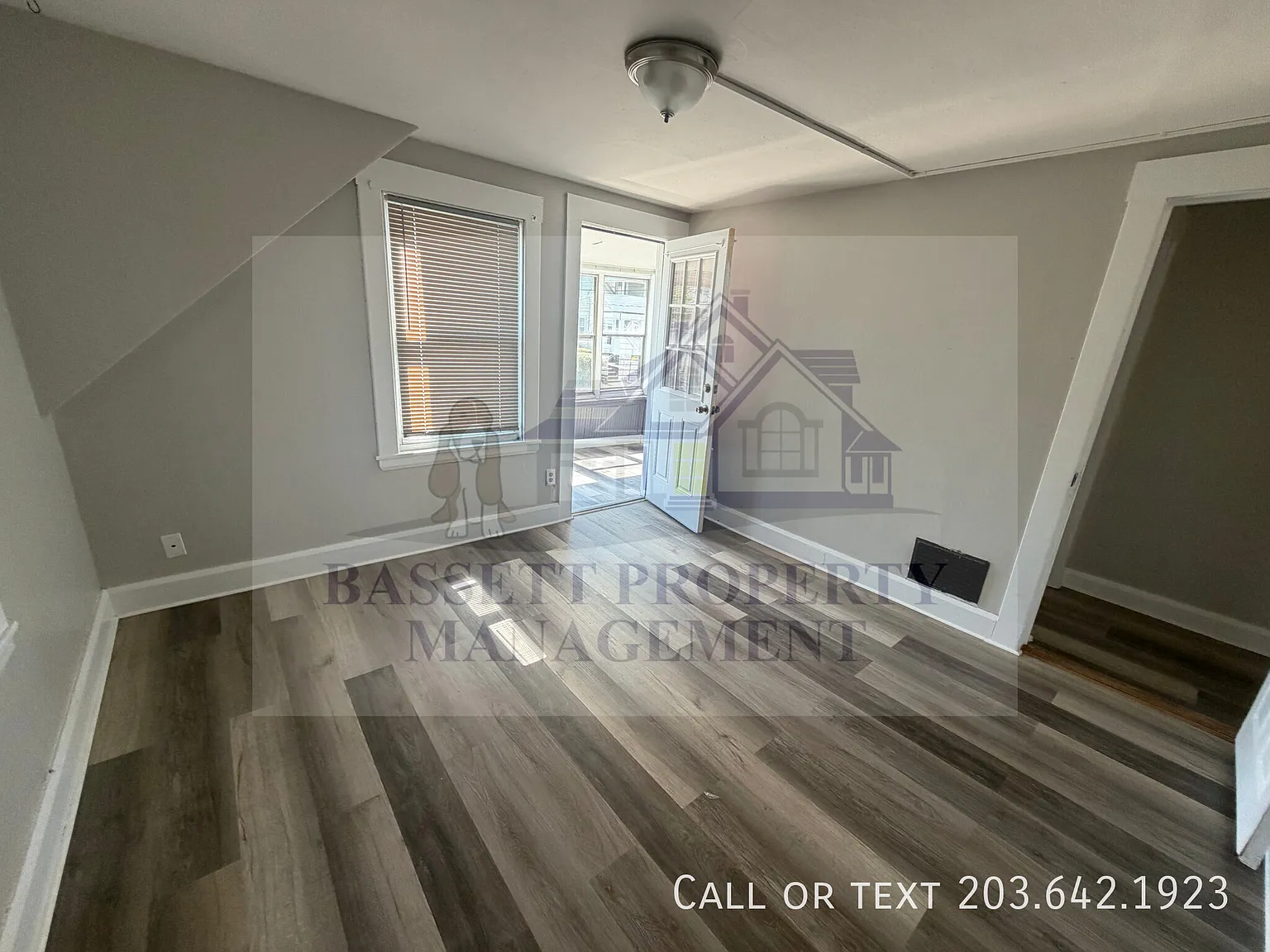 Freshly Updated 3-Bedroom with Sunroom, New Flooring & Laundry Hookups — Photo 4