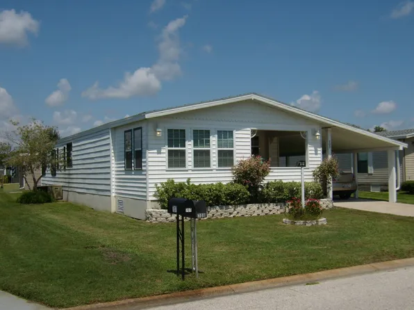 709 Wedelia Dr, Barefoot Bay, FL 32976