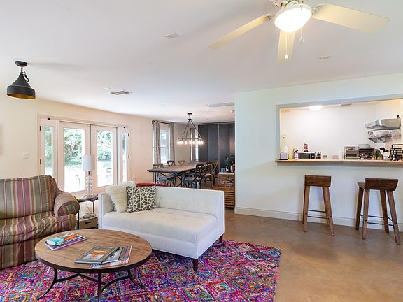 opposite view of living area. bar stools may stay if you wish.