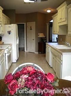 Kitchen
						:
						Roomy kitchen with easy access to dining room to right.