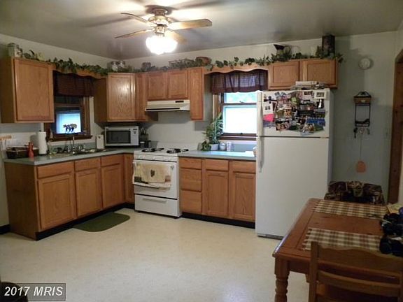 Eat in kitchen with archway to living room