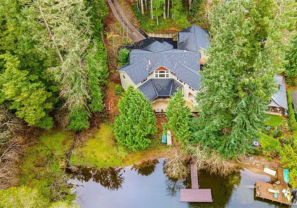 Welcome to your lakeside oasis! Step inside to experience this just-completed stunning custom home which offers an everyday retreat. Savor lake views from almost every room & enjoy a kayak or dip from your private dock.  