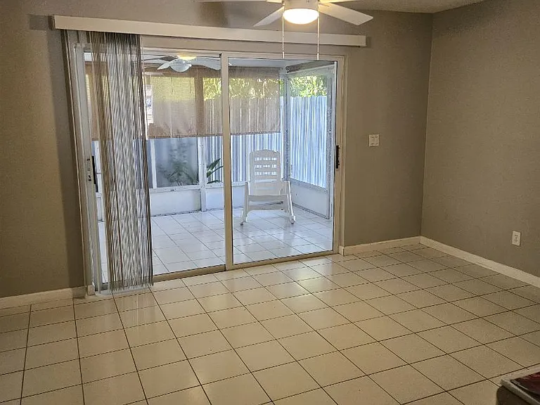 Dining room or Family room leading to enclosed Lanai.