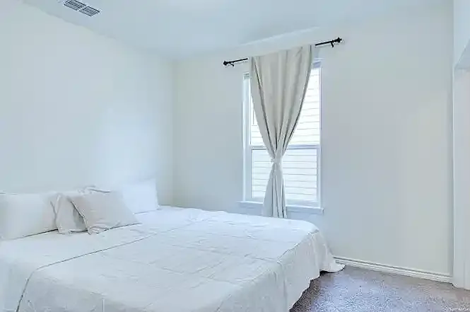 Bedroom #1: First floor: Guest Bedroom with Full Bathroom
