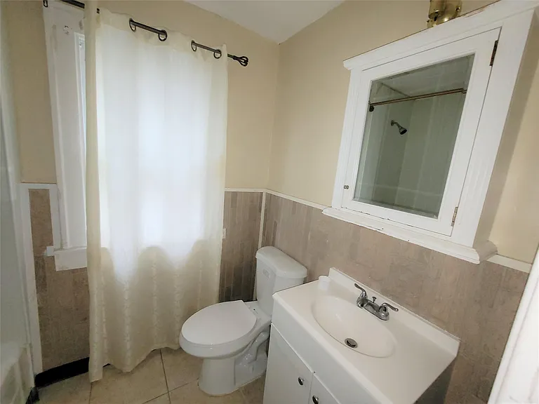 6912 Mansfield St — Photo 11