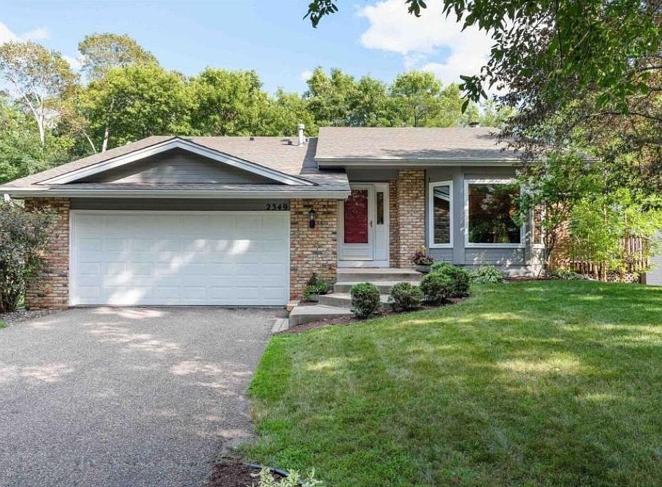 Front of home with 2 car attached garage