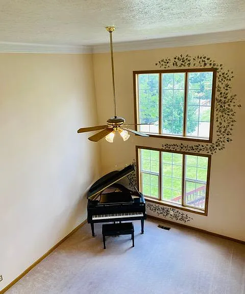 View of formal living room from second floor