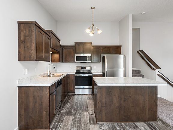 Add some barstools to this centrally located island, and it will quickly become a favorite hang out.