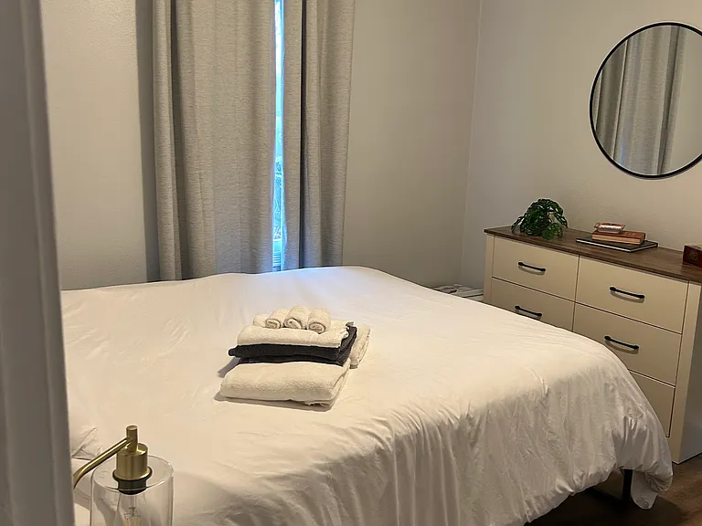 FRONT BEDROOM IS FURNISHED WITH QUEEN SIZE BEDS, ETC.