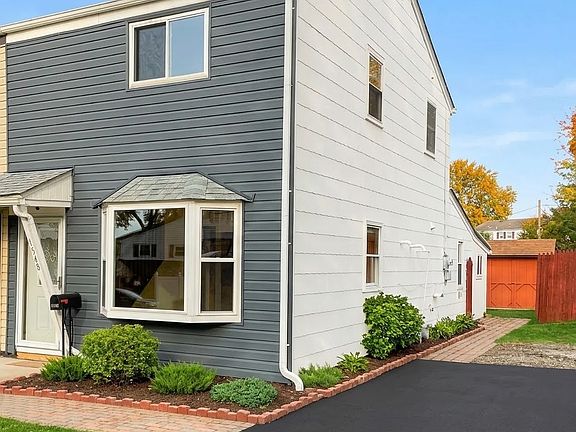 Front and side of house view into backyard