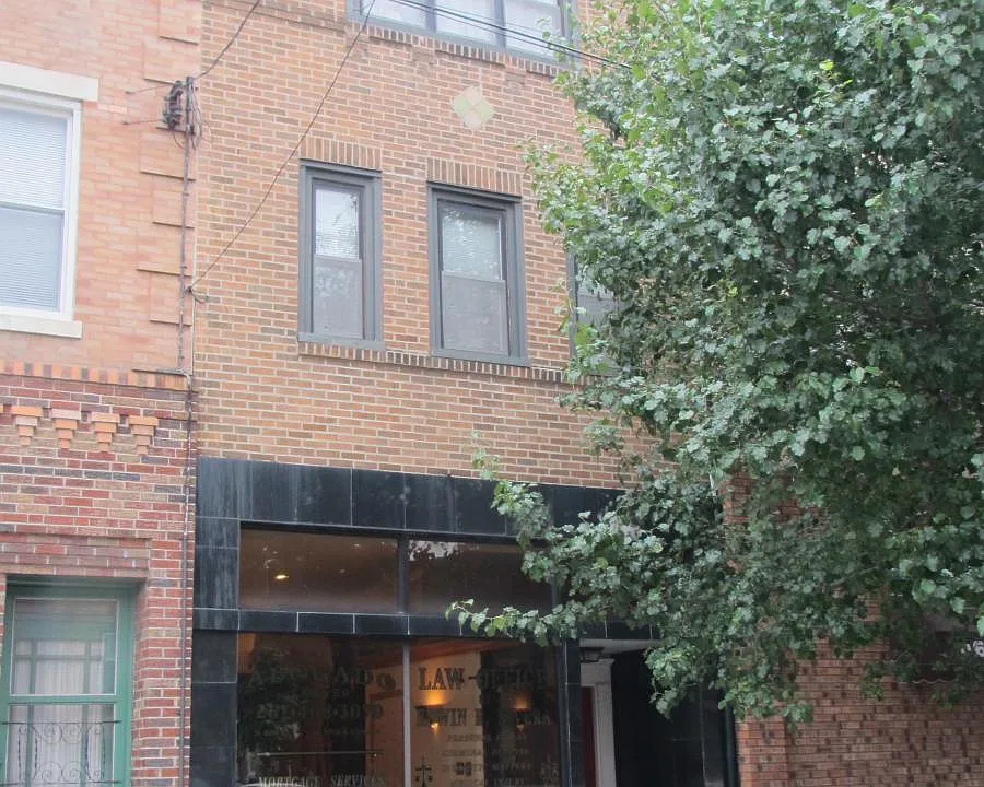 Front of building. Apartment consists of the 2nd and 3rd flo