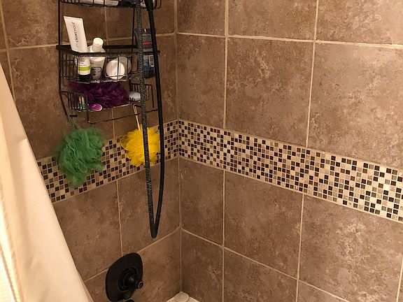 Bathroom w/ new tiled shower
