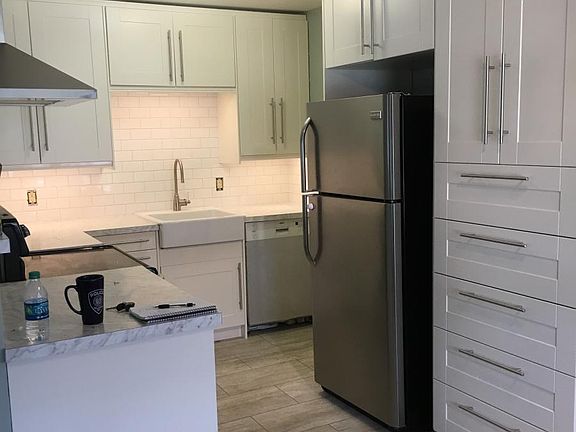 New kitchen with large pantry and new appliances