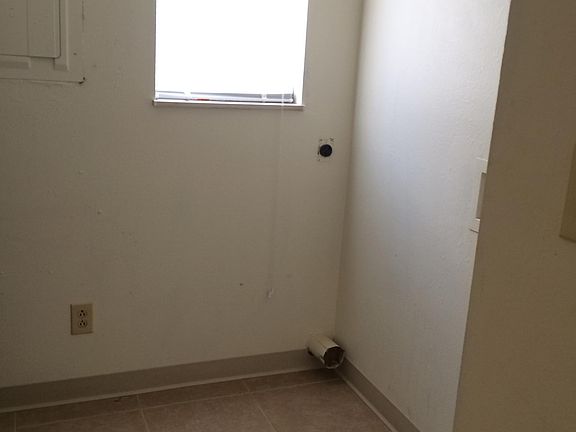 Laundry room in the unit
