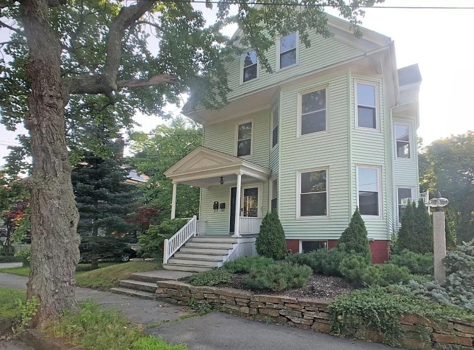Front of house. Unit is on first floor.