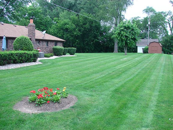 Back yard with mini-barn