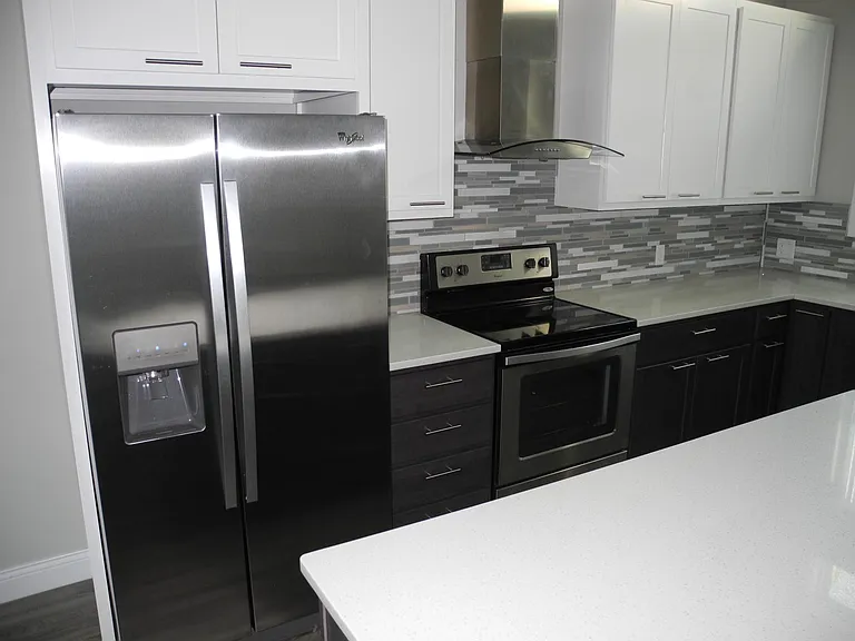 Stainless side by side refrigerator with ice maker