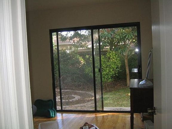 one bedroom opens out onto the backyard