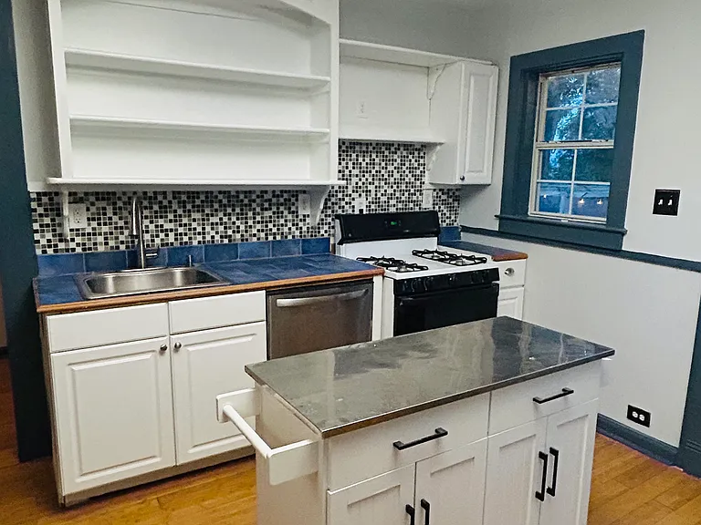 Kitchen - includes all major appliances (Stove/oven, dishwasher, refrigerator) Plus the movable "island"
