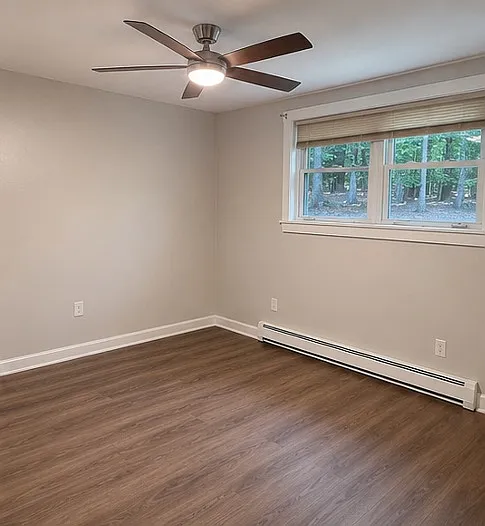 Master bedroom. Full closet, new fan, fresh paint.