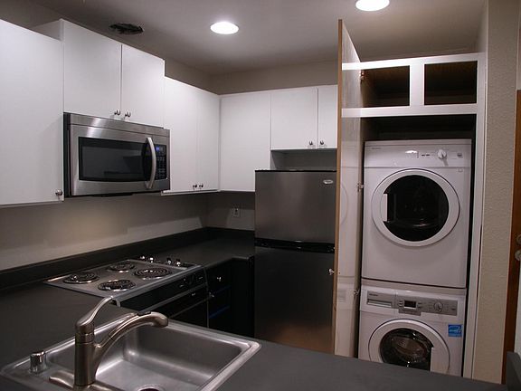 W/D in condo makes laundry secure.
