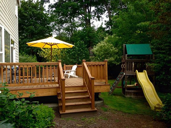 Deck & Rainbow playset with fort canopy and slide