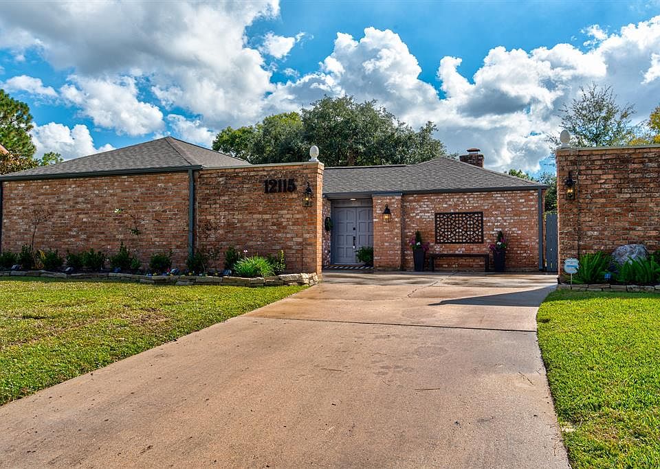 12115 Nova Dr with extra parking inside the walls is only a few hundred yards form neighborhood recreational facilities.