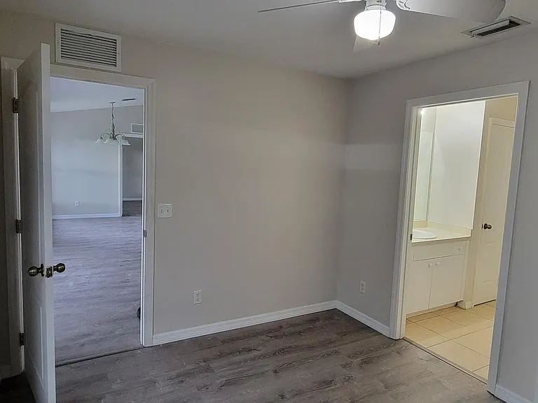 Bedroom 2 looking into Main Living Area and Jack & Jill Bath