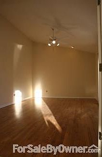 Family Room
						:
						Newly refinished wood floors in the family room with newer sliding glass door.