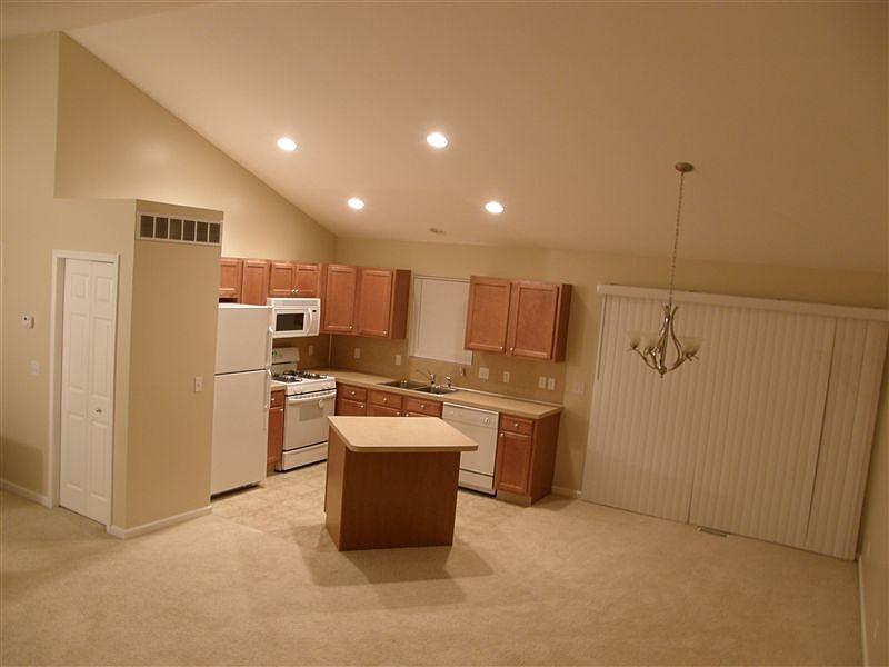 Kitchen Dining Area Taken from Living Area. New carpet not s