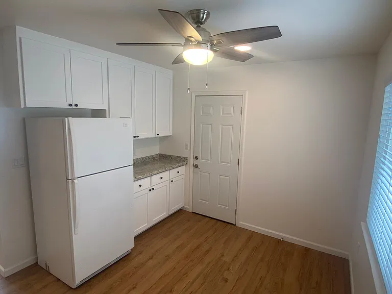 Kitchen with upgraded countertops and plenty of cabinet space.
