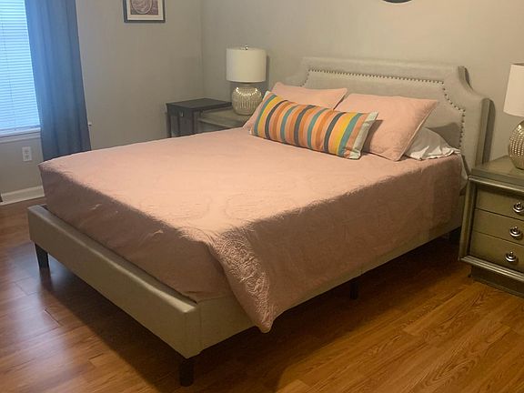 Master bedroom with queen bed.