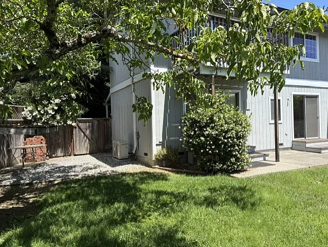 Backyard and side yard with gate
